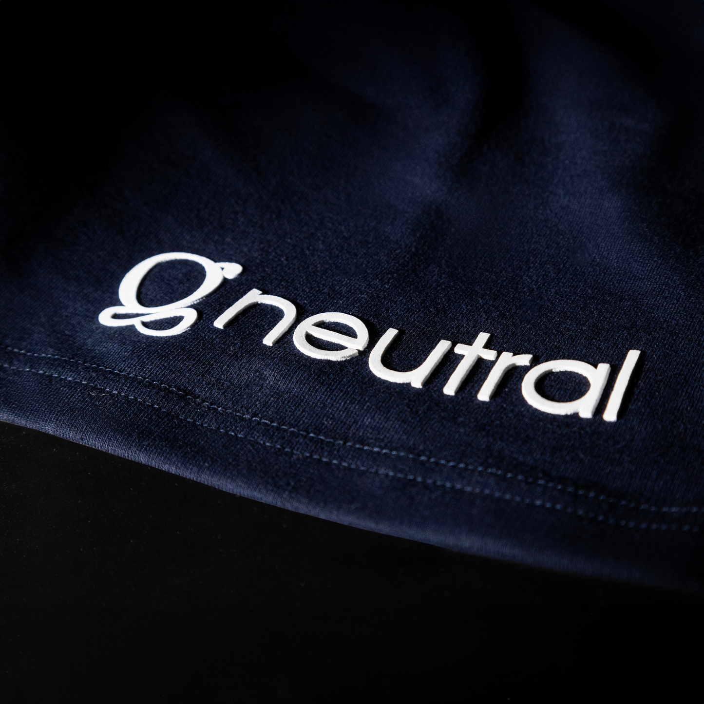 Navy Blue Oversized T-shirt - Solitary Pursuit, close-up logo on left sleeve